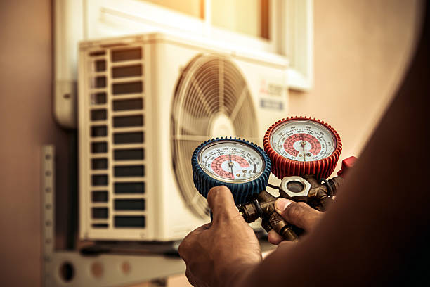 Professional Heat Pump Repair technician working in Hillsdale, KS